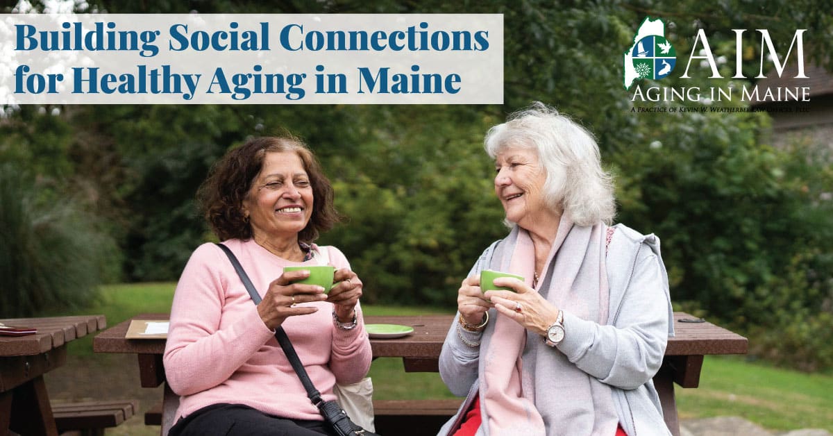 Two older women enjoying coffee together outdoors, promoting social connections and healthy aging in Maine.