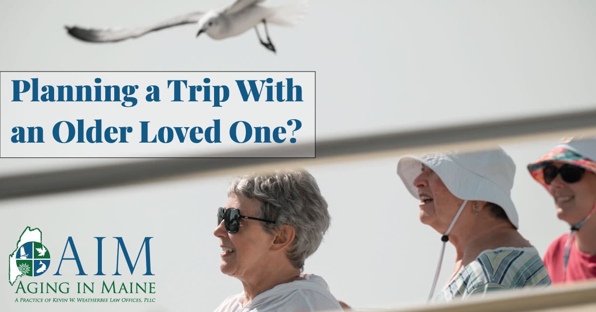 Older adults enjoying a boat trip together, illustrating travel planning tips for families traveling with an older loved one from Aging in Maine.