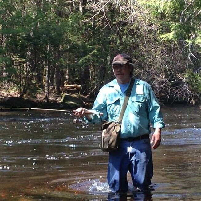 Attorney Kevin W. Weatherbee fly fishing in Maine – Elder Law and Estate Planning Attorney